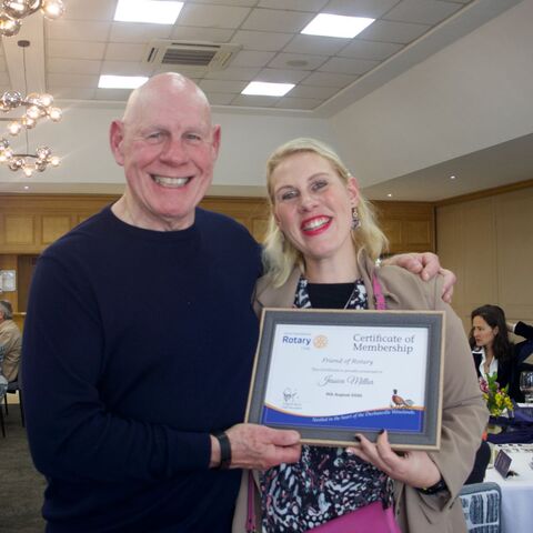 Gordon & Jessica receiving her Friends of Rotary Certificate 